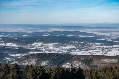 Aerial view of landscape and mountains against sky