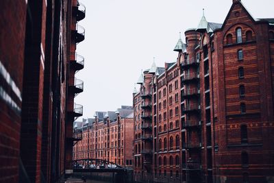 Low angle view of buildings against clear sky