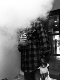 Man smoking electronic cigarette