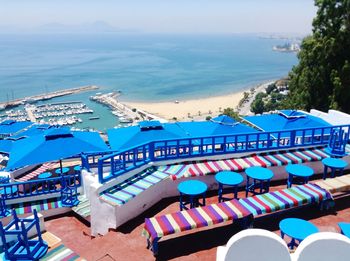 High angle view of chairs on beach