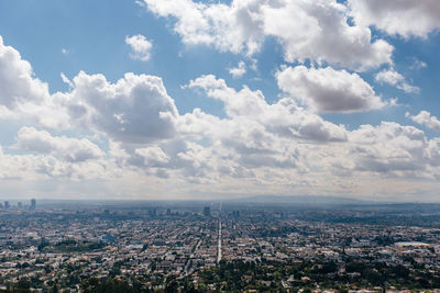 Aerial view of cityscape against sky