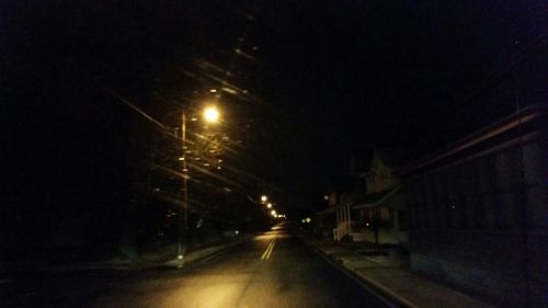 Illuminated street lights at night