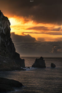 Scenic view of sea against sky during sunset