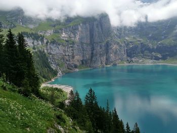 Scenic view of lake and trees against sky