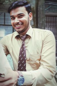 Portrait of young man smiling