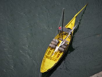 High angle view of yellow ship in river