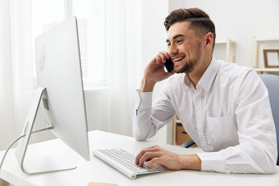 Businesswoman working at desk in office