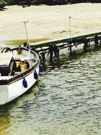 Boats moored in sea