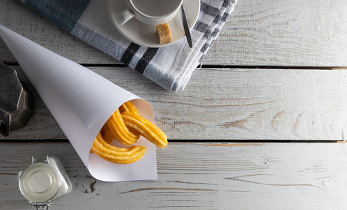 High angle view of coffee cup on table