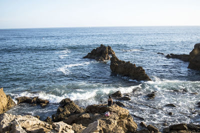 Scenic view of sea against clear sky