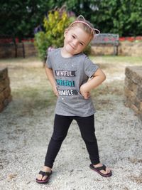 Portrait of girl standing outdoors