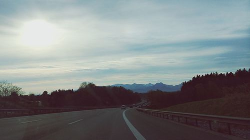 Country road passing through landscape