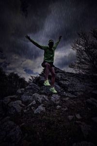 Full length of woman standing against sky