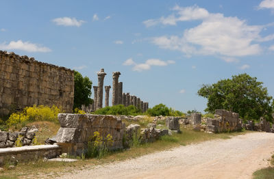Old ruin building against cloudy sky