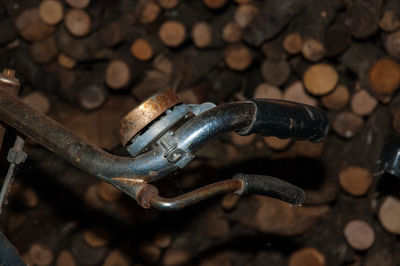 Close-up of rusty chain on wood