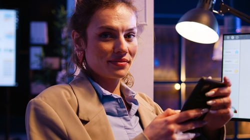 Young woman using mobile phone