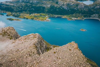 Aerial view of mountain by sea