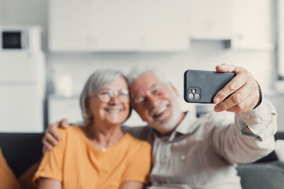 Portrait of woman using mobile phone