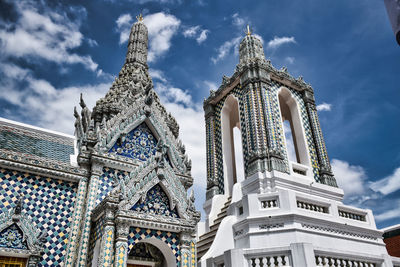 Low angle view of building against cloudy sky