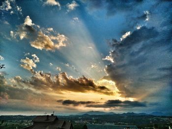 Scenic view of cloudy sky at sunset