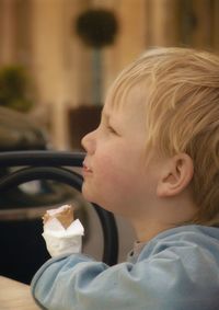 Portrait of cute boy looking away