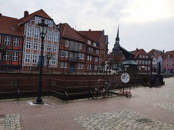 Buildings in city against sky