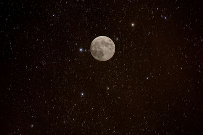 Low angle view of moon in sky