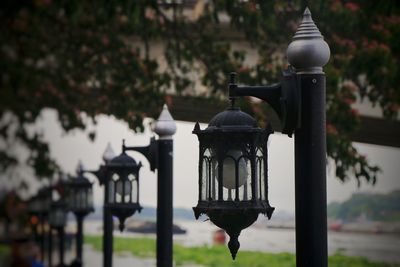 Close-up of street light against wall