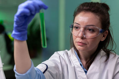 Close-up of scientist working at laboratory