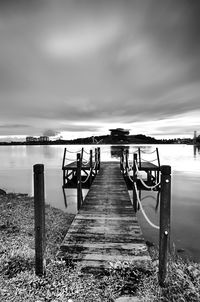 Pier over sea against sky