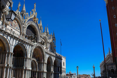 Low angle view of cathedral against blue sky