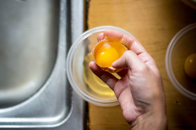 Cropped image of person preparing food