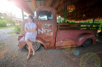 Portrait of man sitting in car