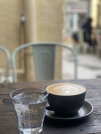 Close-up of coffee cup on table