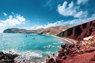 Scenic view of bay against sky