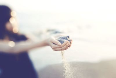 Cropped hand holding water