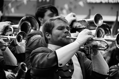 Group of people playing in music concert