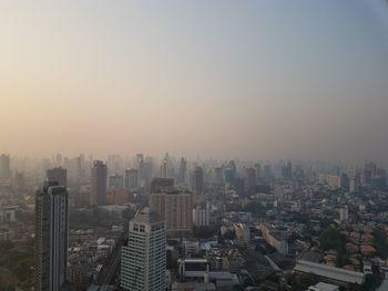 High angle view of buildings against sky in city