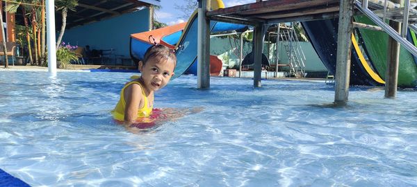 Portrait of boy in swimming pool
