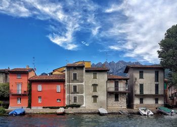 Houses against sky in city