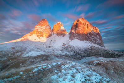 Scenic view of snowcapped mountain against sky during winter