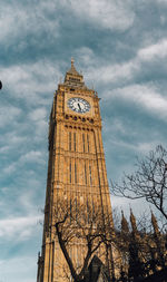 Low angle view of big ben against sky