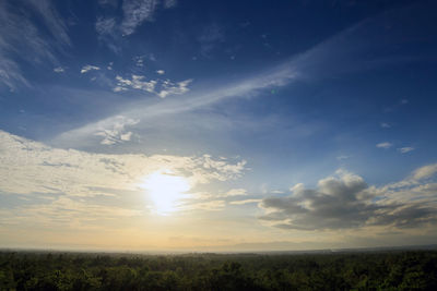 Scenic view of field against sky during sunset