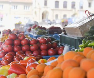 Fresh apricots, peppers, tomatoes and other fruit and vegetables for sale at local farmers market. 