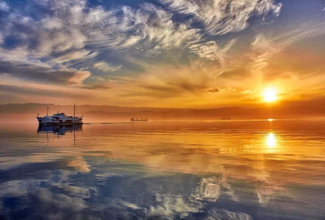 sunset, water, sea, nautical vessel, sky, scenics, transportation, beauty in nature, beach, boat, mode of transport, tranquil scene, orange color, horizon over water, tranquility, sun, cloud - sky, nature, idyllic, shore