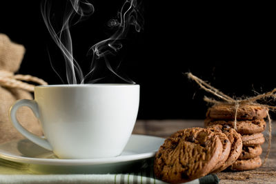 Close-up of coffee cup on table