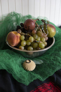 Close-up of fruits in bowl on table
