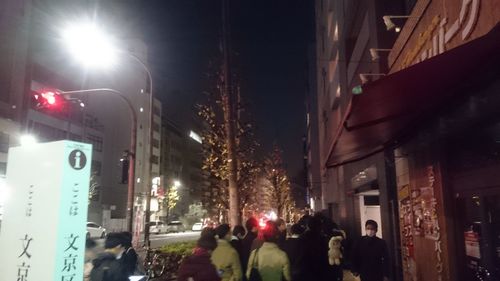 View of illuminated street at night