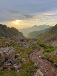 Scenic view of landscape against sky during sunset