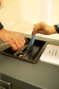 Close-up of man working on table